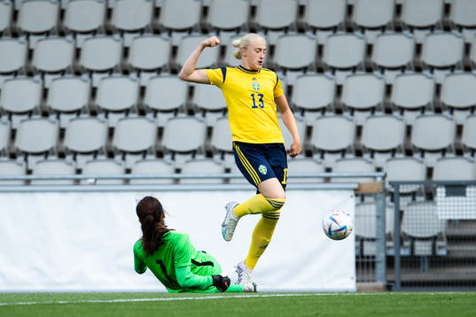 Goalkeeper Liu Chen of China and Wilma Leidhammar of Sweden