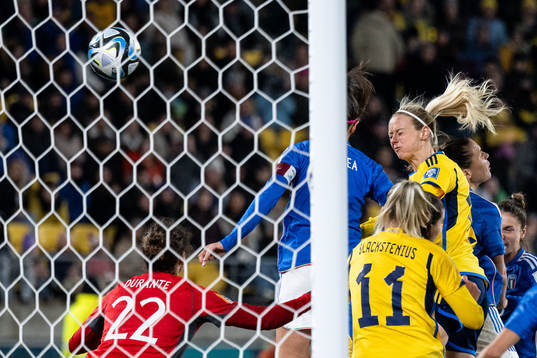 Amanda Ilestedt of Sweden scores 4-0 behind goalkeeper