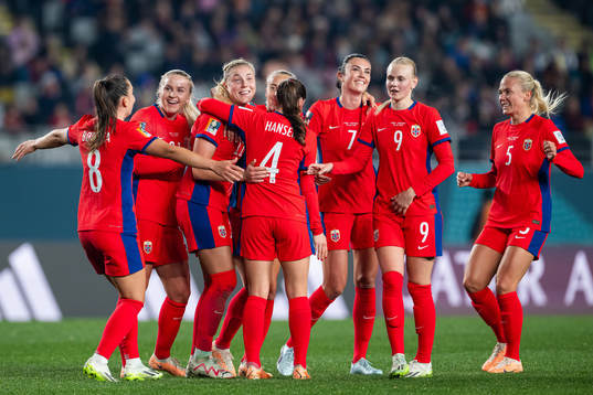 Sophie Román Haug of Norway celebrates with teammates