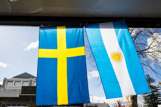 A Swedish and an Argentinian flag