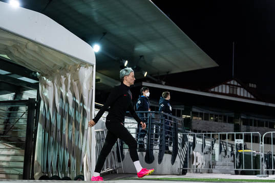 at a training session with the women's national football