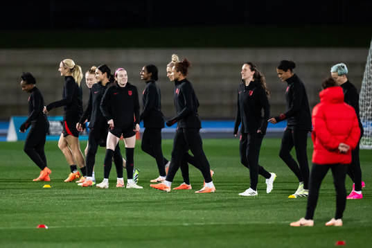 Rose Lavelle with team mates at a training session with the