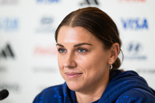 Alex Morgan at a press conference with the women's national