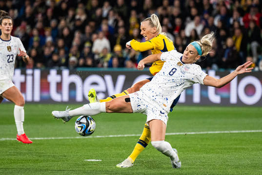 Stina Blackstenius of Sweden and Julie Ertz of USA