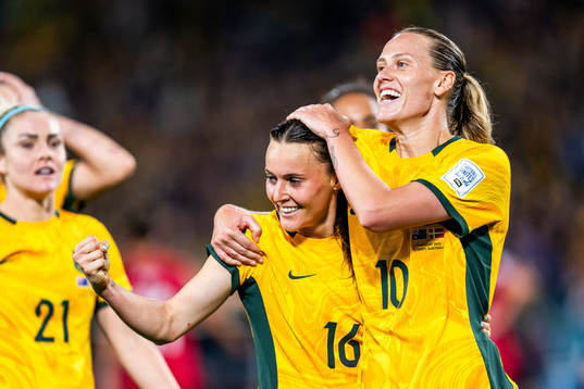 Hayley Raso and Emily van Egmond of Australia celebrates