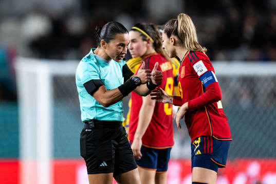 Referee Edina Alves and Olga Carmona of Spain
