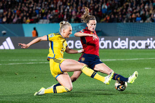 Stina Blackstenius of Sweden and Irene Paredes of Spain