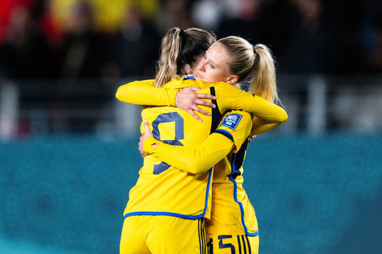 Kosovare Asllani and Rebecka Blomqvist of Sweden look