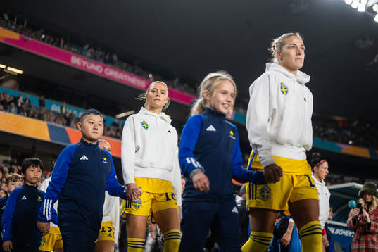 Fridolina Rolfö and Filippa Angeldahl of Sweden enter the