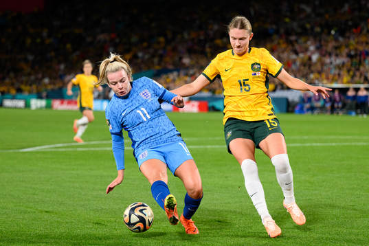 Lauren Hemp of England and Clare Hunt of Australia