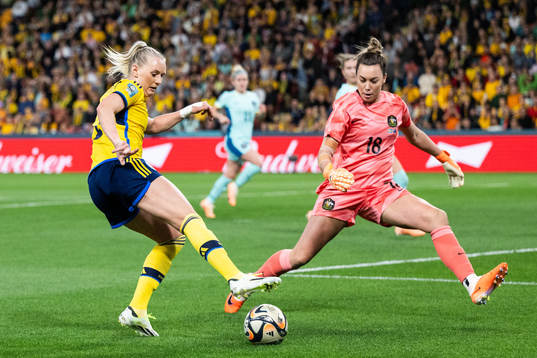 Stina Blackstenius of Sweden and goalkeeper Mackenzie