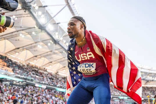 Noah Lyles of USA celebrates