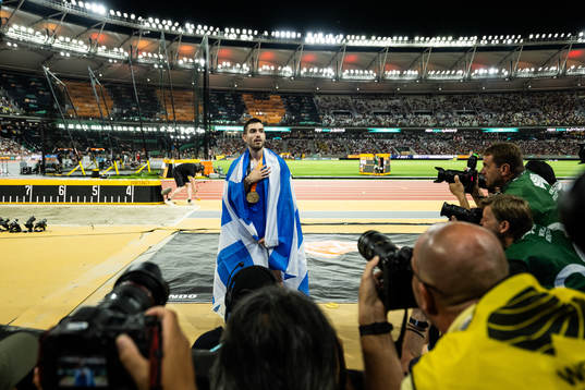 Miltiadis Tentoglou of Greece celebrates