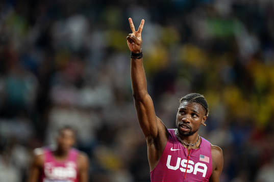 Noah Lyles of USA celebrates