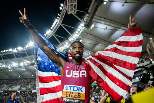 Noah Lyles of USA celebrates