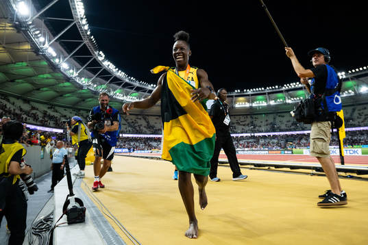 Shericka Jackson of Jamaica celebrates