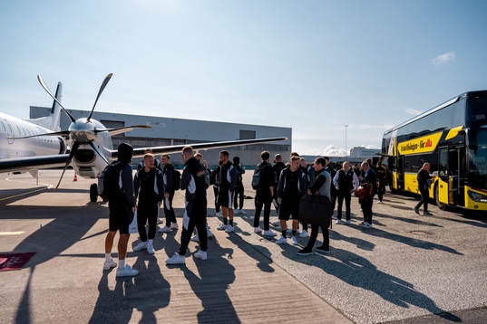 The Häcken team about to board the airplane