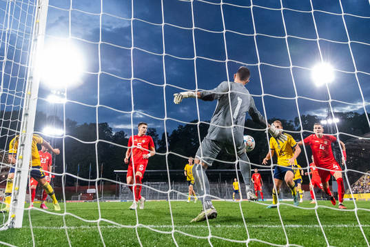 goalkeeper Marko Alchevski of North Macedonia with a save