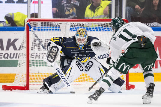 HV71s målvakt Joni Ortio och Färjestads Joakim Nygård