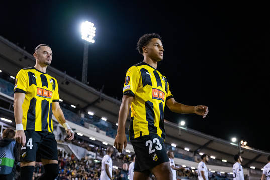Amor Layouni and Momodou Lamin Sonko of Häcken enter the