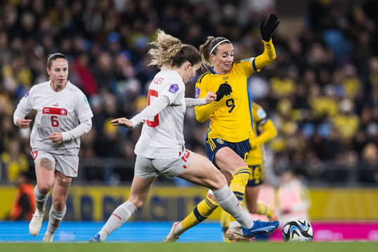 Luana Buhler of Switzerland and Kosovare Asllani of