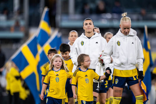 Goalkeeper Zecira Musovic and Caroline Seger of Sweden