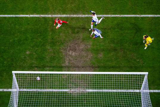 Marit Bratberg Lund of Norway scores the 1-1 goal past
