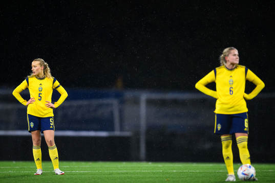 Smilla Holmberg and Sara Frigren of Sweden look dejected