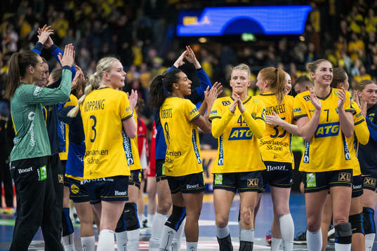 The Swedish players celebrate