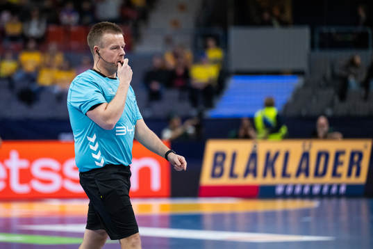 Referee Jesper Madsen in a video review