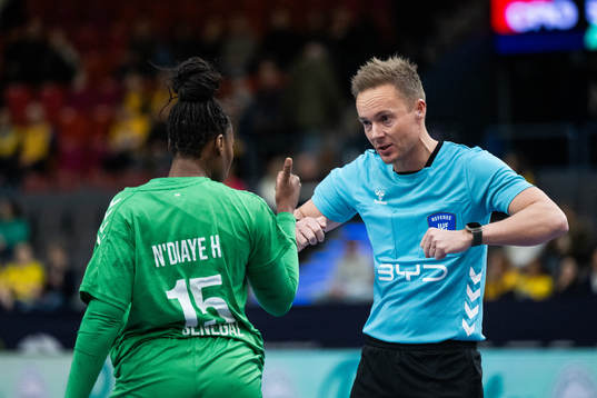 Ramatou Hawa Ndiaye of Senegal and referee Mads Hansen