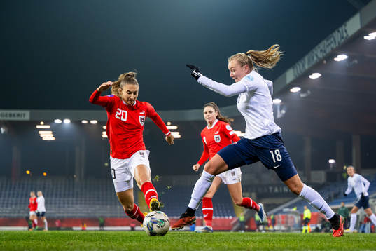 Katharina Naschenweng of Austria and Frida Maanum of Norway