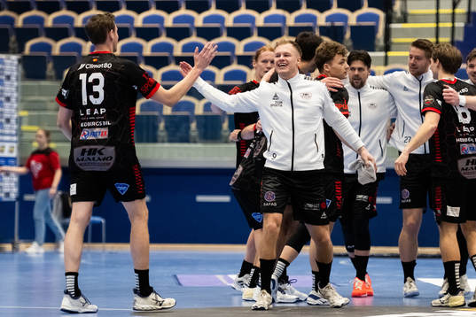 HK Malmös Eric Palmqvist och Adam Tumba jublar