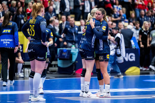 Emma Lindqvist and Anna Lagerquist of Sweden look dejected