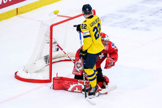 Anton Wahlberg of Sweden and goaltender Alessio Beglieri of