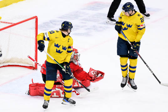 Goaltender Alessio Beglieri of Switzerland against Liam