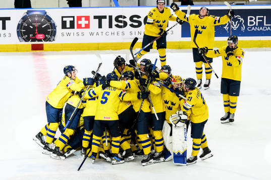 Players of Sweden celebrate