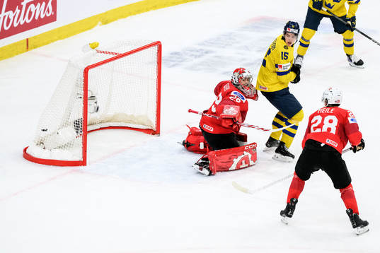 Axel Sandin-Pellikka of Sweden (not pictured) scores 3-2