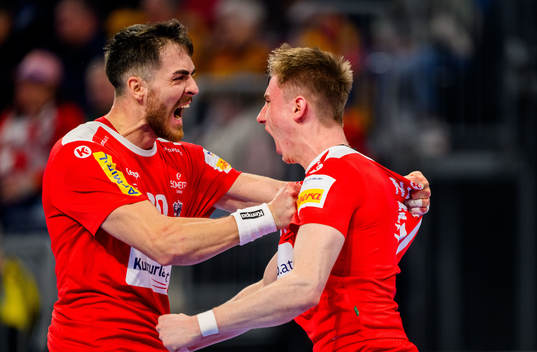 Sebastian Frimmel and Jakob Nigg of Austria celebrates
