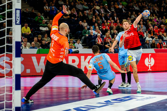 Mathias Gidsel of Denmark and Bart Ravensbergen of the
