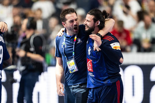 Head coach Guillaume Gille and Elohim Prandi of France