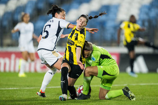Ivana and goalkeeper Mylene Chavas of Real Madrid against