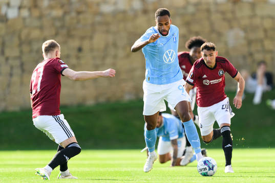 Isaac Kiese Thelin of Malmö FF and Qazim Laci of Sparta