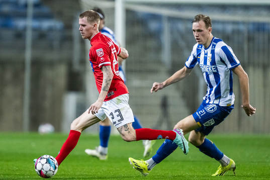 Tonni Adamsen of Silkeborg and Adam Carlén of IFK Göteborg