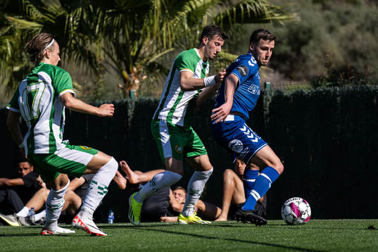 Jeppe Andersen of Sarpsborg 08 against August Mikkelsen and