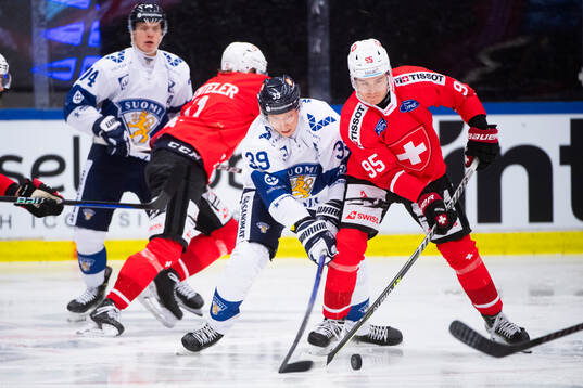 Sebastian Repo of Finland and Tyler Moy of Switzerland