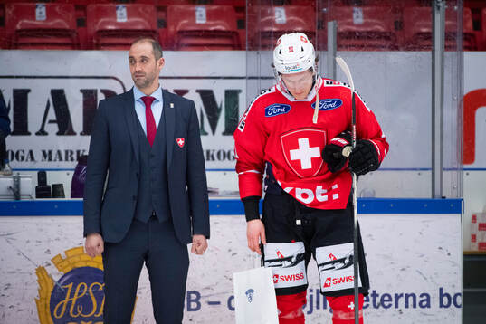 Sven Senteler of Switzerland looks dejected