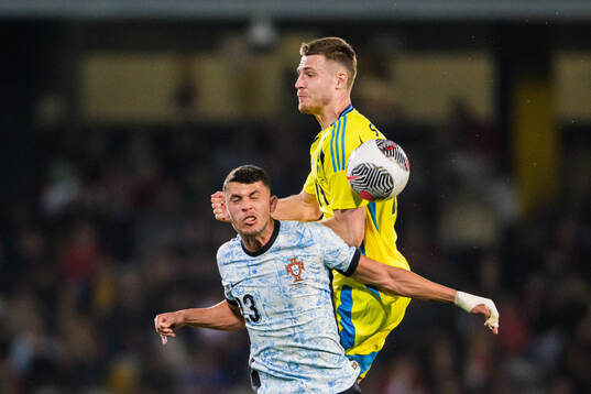 Matheus Nunes of Portugal and Mattias Svanberg of Sweden