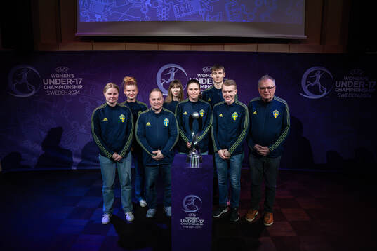 Hosts of team Sweden poses for a picture