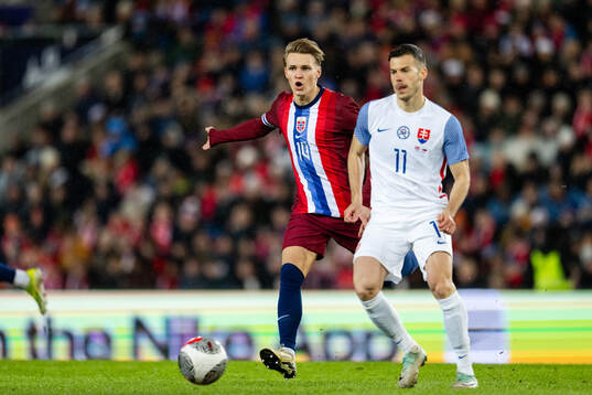 Martin Ødegaard of Norway and Laszlo Benes of Slovakia